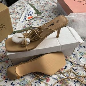 Beige, strap up heels